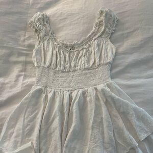 Urban outfitters— Rosie smocked tiered ruffle romper